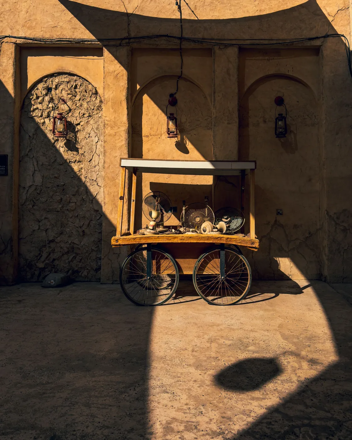 A shaded courtyard and arches in the Al Fahidi historical district