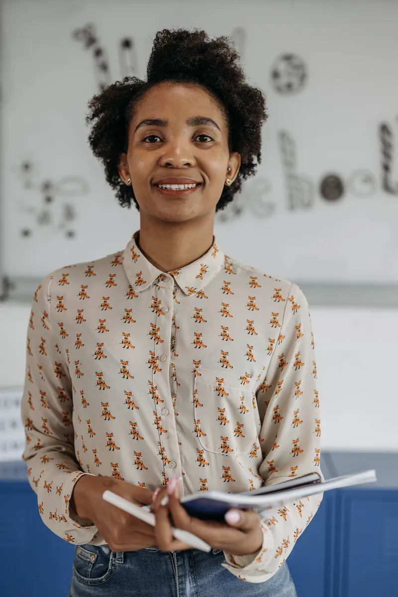 A colleague with her notebook in the studio
